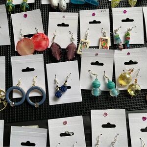 Designer earrings. All carded. Originally sold for $24/pair.